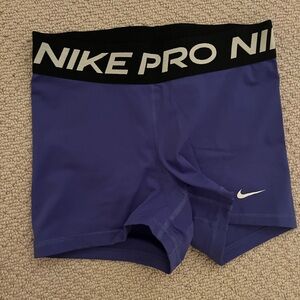 Purple/blue Nike Pros